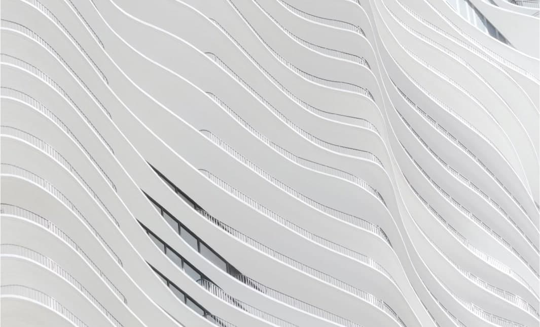 White curvy building